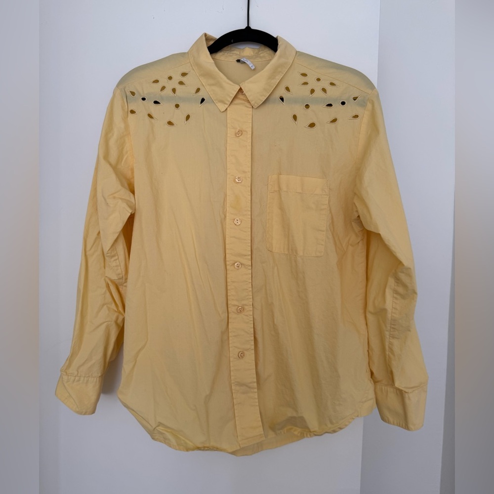 Yellow button down shirt